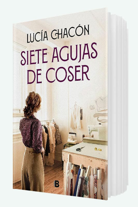 Writer Lucía Chacón signs her novel 'Siete agujas de coser' at the